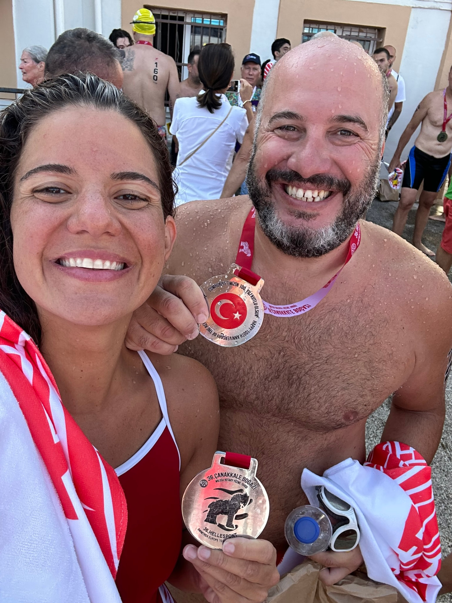 Yasemin and Murat with their medals after the Dardanelles swim